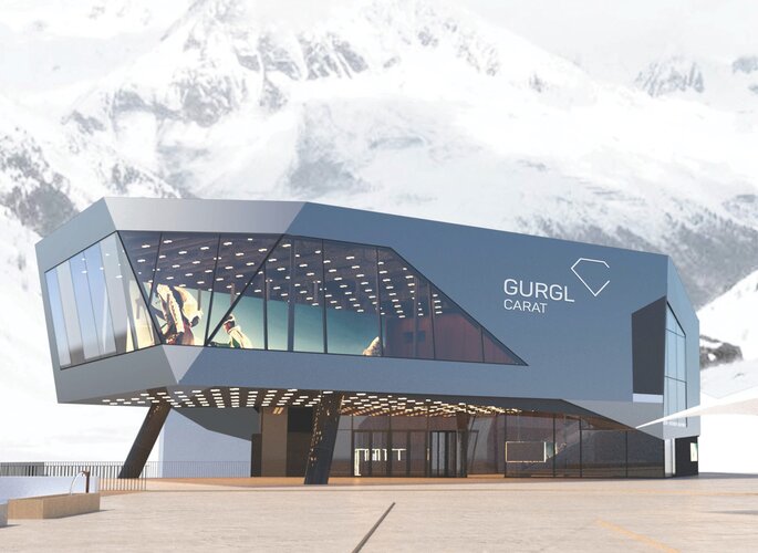 Ein modernes Gebäude mit großen Glasflächen vor verschneiten Berggipfeln.